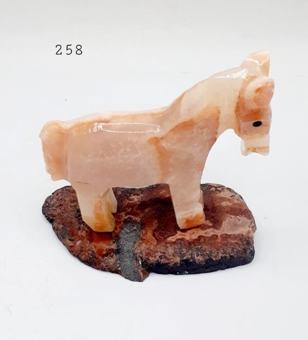 Cute Donkey (Onyx Stone) On Red Crazy Lace Agate Stone