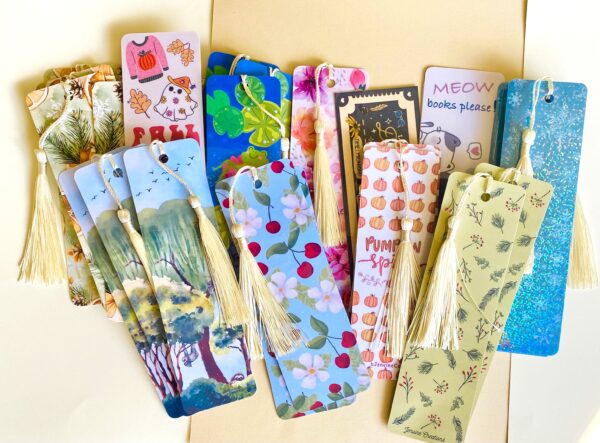 Handmade laminated bookmarks 2"x6", various designs, some including a tassel