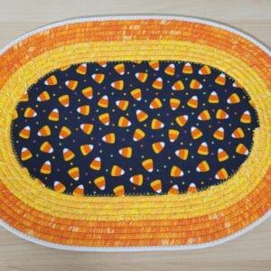 Oval Fabric-Wrapped Candle Mat