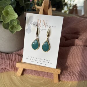 Gold framed & teal tear drop earring