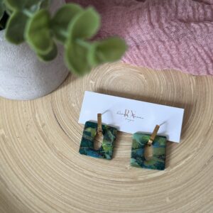 Green & gold charms on gold huggie earrings