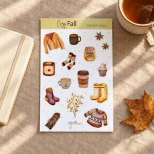 a sticker sheet with various designs like sweater, fall foliage, candle socks, mugs, jam